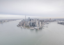 High Angle View Of Cityscape By Hudson River Against Cloudy Sky