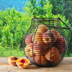 Wall Mural - Ripe peaches in basket