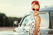 Beautiful Girl In Retro Style And A Vintage Car