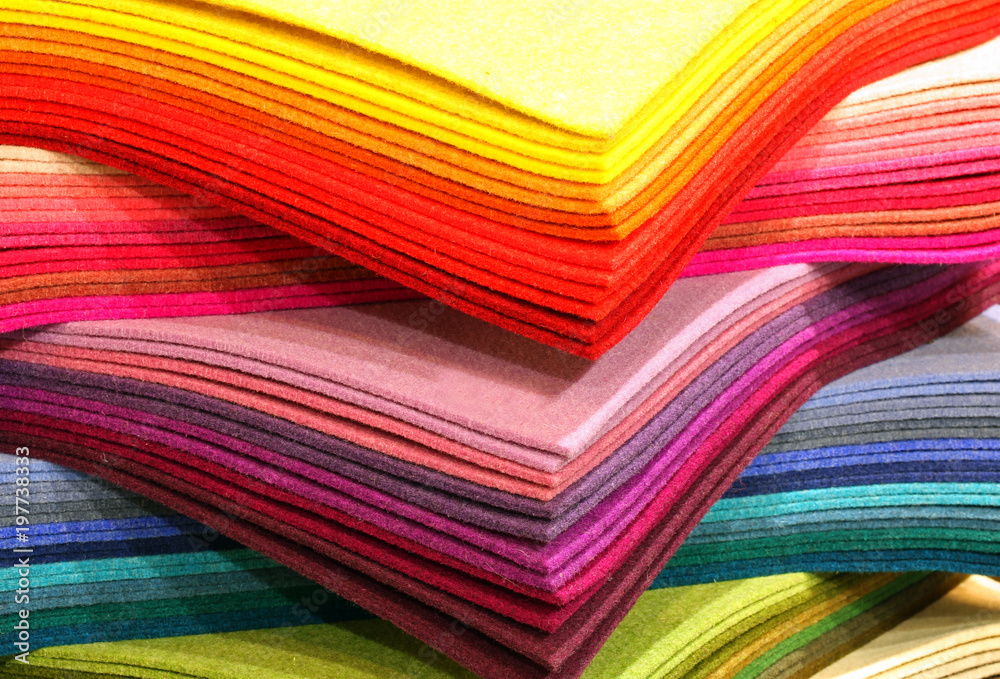 many pieces of colored felt on sale in the haberdashery shop - obrazy, fototapety, plakaty 