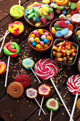 Wall Mural - candies with jelly and sugar. colorful array of different childs sweets and treats.