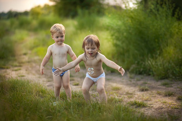 Wall Mural - Happy twins outdoor