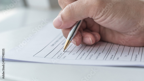 Cuadros en Lienzo Applicant filling in company application form document applying for job, or regi