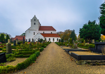 Wall Mural - Dalby - October 21, 2017: Historic church of the Holy Crross Priory in Dalby, Sweden