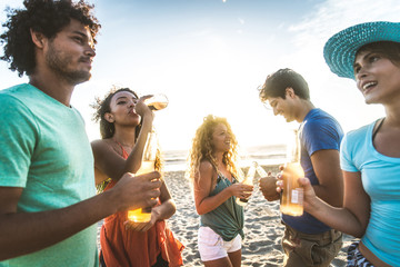 Wall Mural - Friends partying on the beach