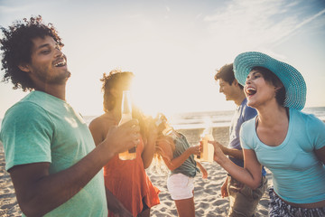 Wall Mural - Friends partying on the beach