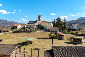 View of San Vittore romanesque Church located in the locality Canonica of Brezzo di Bedero above lake Maggiore in province of Varese, Italy