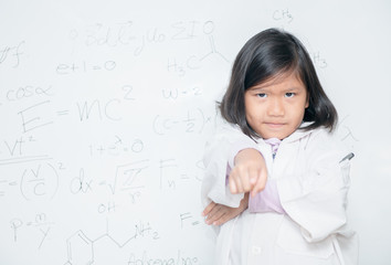 Wall Mural - angry little scientist pointing finger on white borad