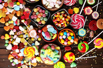 Wall Mural - candies with jelly and sugar. colorful array of different childs sweets and treats.