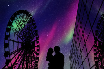 Sticker - Lovers in amusement park at night. Vector illustration with silhouette of loving couple and Ferris wheel. Northern lights in starry sky