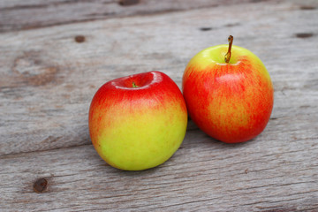 Wall Mural - Red apple on wooden background 