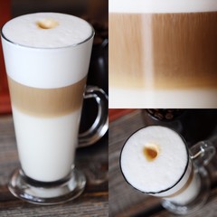 Delicious fresh latte coffee on wooden table 