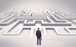 © ra2 studio - Businessman getting ready to enter a 3D flat labyrinth concept