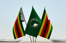 Two Flags Of Zimbabwe And African Union Flag Between