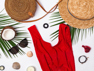 Feminine summer travel accessories on the white background