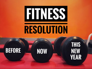 Wall Mural - Fitness resolutions concept - Words Before, Now and This New Year written on dumbbells in a fitness gym. With vintage styled background.