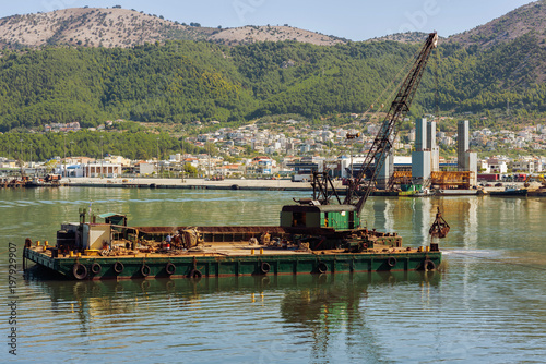 Fotografia, Obraz Dredge ship on the sea on the Igoumenitsa port in the Greece