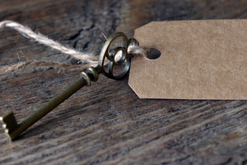 Antique Key with Brown Label