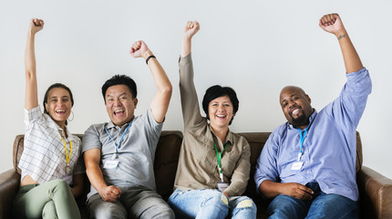 Wall Mural - Workers sitting and cheering together