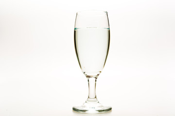 Wine glass with empty copy-space area for slogan or advertising text message, over isolated white background.