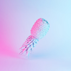 Wall Mural - pineapple in vibrant bold gradient holographic neon colors. concept art. minimal surrealism backgrou