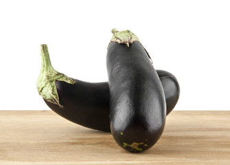 eggplant on a cutting board isolated on a white background