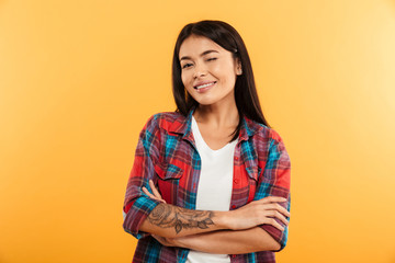 Portrait of a smiling young asian girl looking at camera