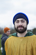 © Mint Images - Portrait of a bearded Caucasian man in sports gear, outdoors.