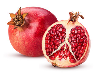 Wall Mural - Ripe pomegranate fruit and one cut in half