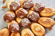 © Aleksey - Tasty almond cookies arranged in the shape of fan on white background, close-up, selective focus