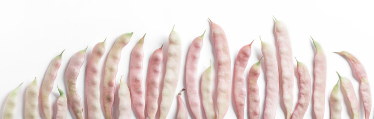 Wall Mural - Pink french beans large arrangement closeup overhead isloated on white background in studio