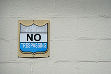 No Trespassing Sign On Wall