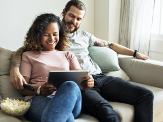 Wall Mural - Couple relaxing at home