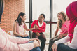 © Atstock Productions - Casual multiethinic women sitting in circle in the meeting