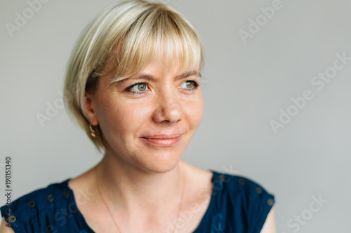 Young Cute Blonde Woman In Studio Smiling Girl With Bob Haircut