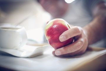 Sticker - Apple in hand.