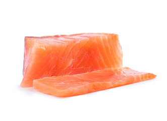 Wall Mural - Chopped salmon slices close-up on white background