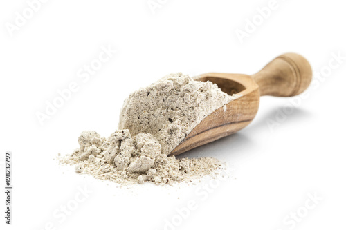 Cuadros en Lienzo Buckwheat flour in scoop on white background
