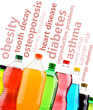 Plastic bottles of assorted carbonated soft drinks over white