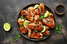 Grilled Teriyaki Chicken Wings With Black Sesame And Lime.Top View.