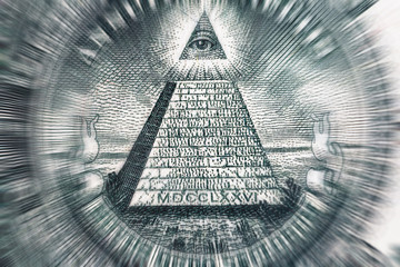 Conspiracy theory concept. All Seeing Eye and Pyramid on USA dollar banknote, macro photo