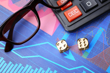 Canvas Print - Dices, glasses and calculator on stock data graph. Finance trading concept