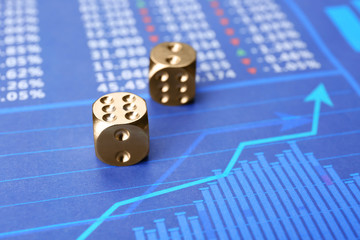 Canvas Print - Dices on stock data graph. Finance trading concept