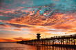 © Ryan Longnecker - View of silhouette pier against cloudy sky at sunset