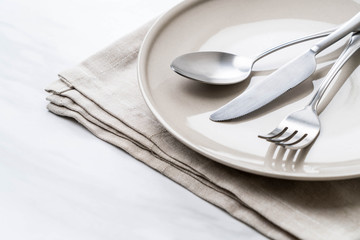 Wall Mural - empty plate spoon fork and knife