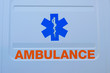 Photograph of ambulance car sign and text on white. The emergency services 
