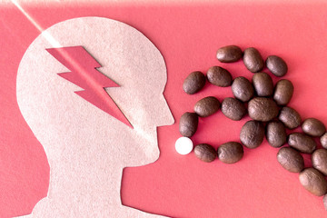 Image of a man made of cardboard red background lightning beam hand made of coffee beans with pills sign dependence on caffeine and stimulating