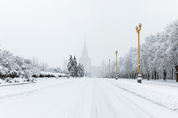 Wall Mural - Heavy snowfall in Moscow. houses and streets during blizzard