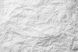 Background of crumpled white gray monochrome bakery paper