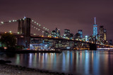 Fototapeta  - Purple sunset view of Brooklyn bridge and lower Manhattan skyline